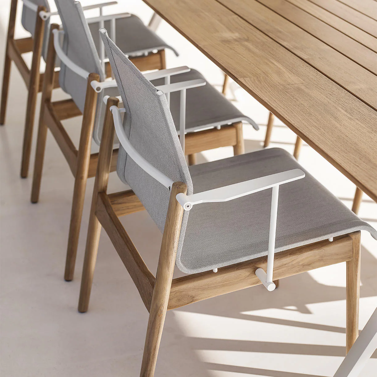 Sway Teak Stacking Chairs with Arms - Image 4